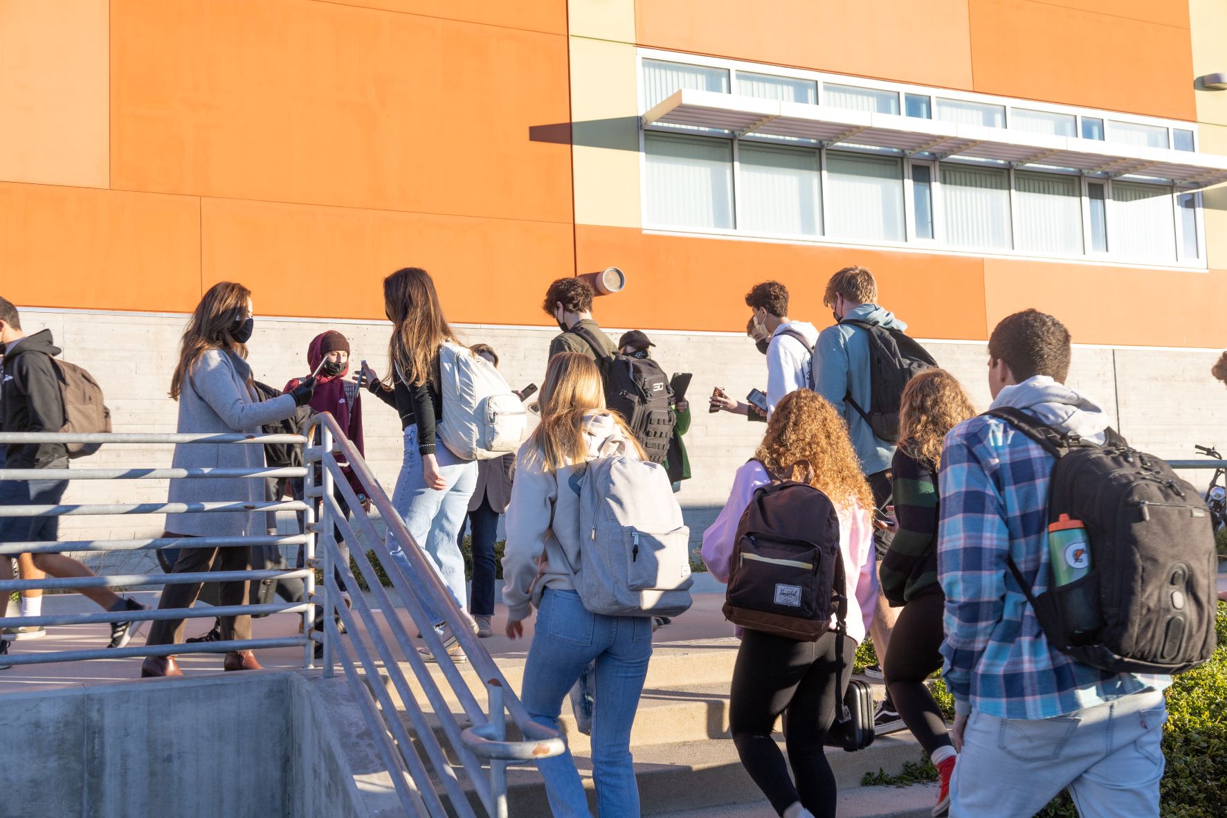 Another winter surge as COVID cases spike, schools fight to stay open ,and health care workers face exhaustion. But Omicron could end the pandemic