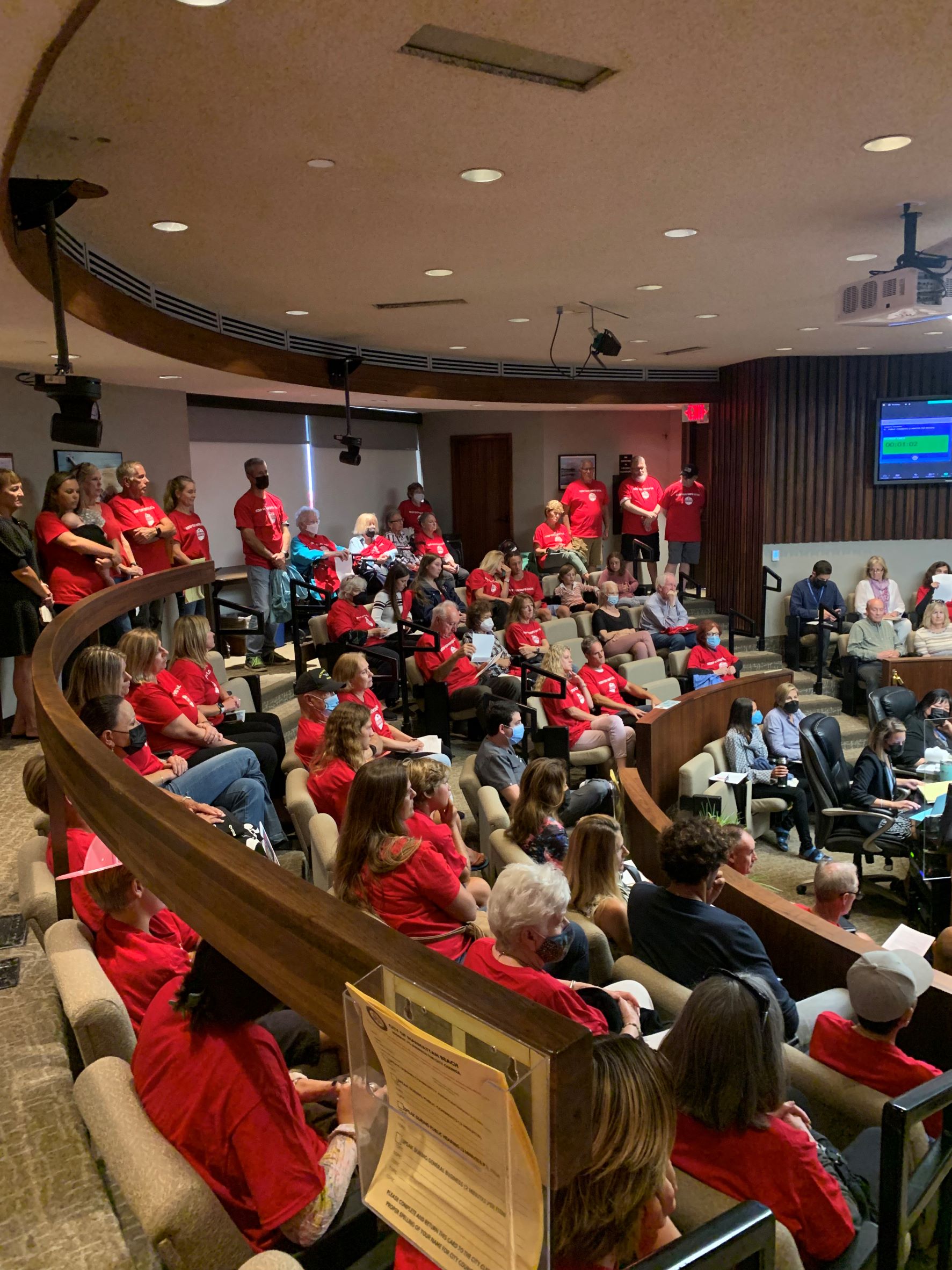 CITY COUNCIL – Firefighters from Manhattan Beach and their supporters storm City Hall